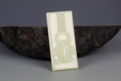 A FINELY CARVED HETIAN PALE CELADON JADE PENDANT PENDANT