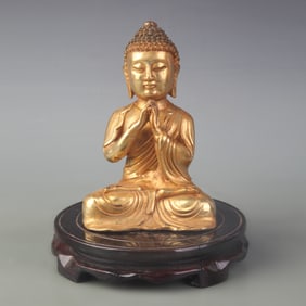 A SMALL BRONZE SHAKYAMUNI BUDDHA STATUE