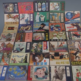 32 VOLUMES OF CHINESE COMIC BOOKS