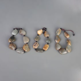 THREE HETIAN JADE BEAD BRACELETS