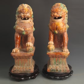 PAIR OF SANCAI CERAMIC GUARDIAN LIONS