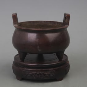 A FINE BRONZE TREE FOOT INCENSE BURNER