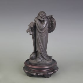 A FINE CAST IRON ARHAT STATUE