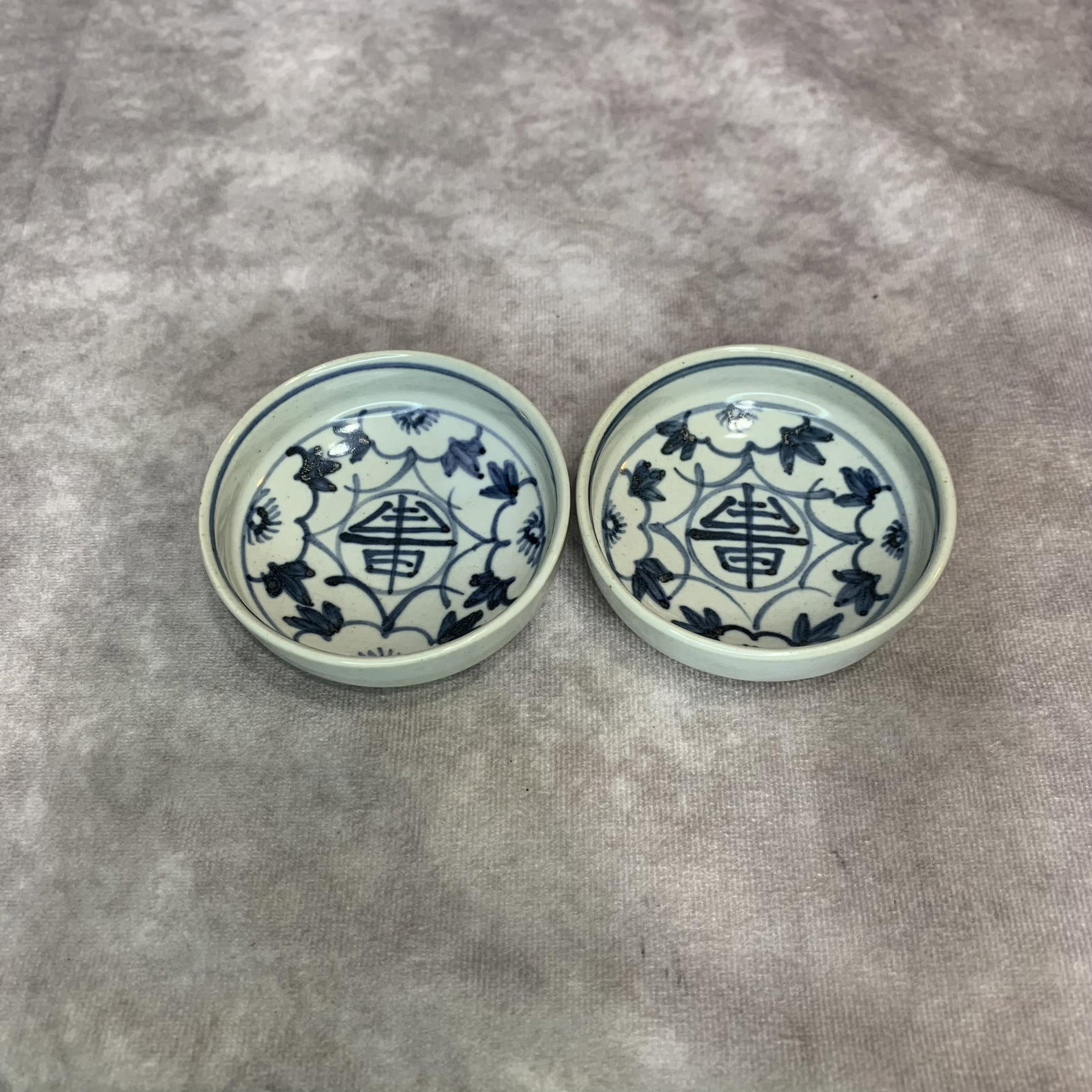 PAIR OF SMALL BLUE AND WHITE PORCELAIN DISHES: Modern; High: 1.0 inch; Diameter: 3.0 inch;