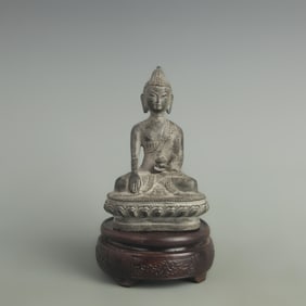 A FINE BRONZE GUANGDE BUDDHA STATUE