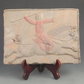 A FINE TANG DYNASTY STYLE PLAYING XI JIU CARVED ON CLAY BRICK