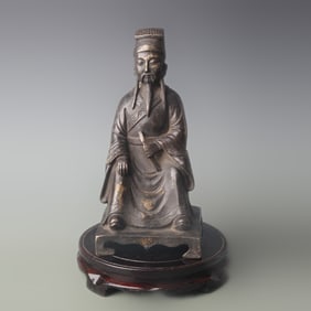 A FINE BRONZE DEITY STATUE