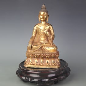 A FINE TIBETAN BUDDHIST BRONZE STATUE