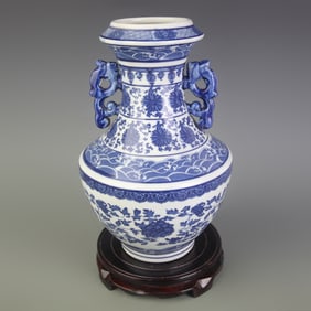 BLUE AND WHITE DEER-HEAD WINE VESSEL WITH DRAGON AND FLORAL DECORATION