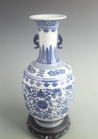BLUE-AND-WHITE TWIN-HANDLED BOTTLE WITH SCROLLING LOTUS DESIGN