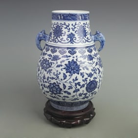 RARE BLUE AND WHITE ENTWINED FLORAL DOUBLE-HANDLED PORCELAIN VASE