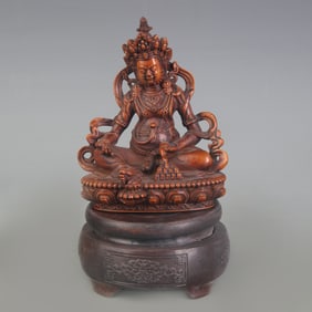 A FINE WOOD CARVING YELLOW WEALTH DEITY STATUE