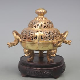 GILT BRONZE INCENSE BURNER WITH DRAGON-SHAPED HANDLES AND THREE FEET
