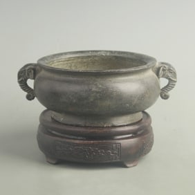 A FINE BRONZE ELEPHANT-EAR CENSER
