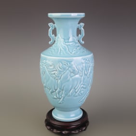 CELADON GLAZED DOUBLE HANDLED VASE WITH EIGHT STEEDS DESIGN