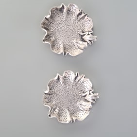 PAIR OF SILVER-PLATED SMALL PLATES
