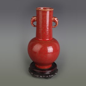 RED-GLAZED ELEPHANT EAR PORCELAIN VASE