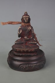 SMALL TIBETAN BUDDHIST STATUE