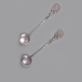 PAIR OF COIN TESTING SPOONS