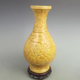 A FINE YELLOW GROUND CARVED EIGHT IMMORTALS FIGURE PORCELAIN VASE