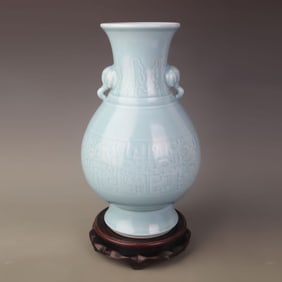 CELADON-GLAZED VASE WITH ELEPHANT-SHAPED HANDLES