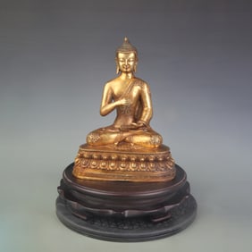 A RARE GILT BRONZE SHAKYAMUNI BUDDHA