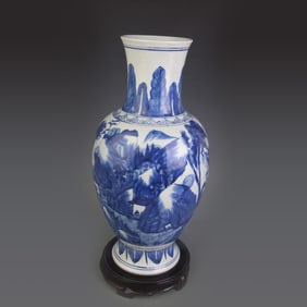 BLUE AND WHITE VASE WITH LANDSCAPE DESIGN