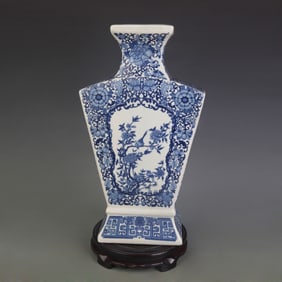 BLUE AND WHITE SQUARE VASE WITH FRAMED FLORAL AND BIRD DESIGN