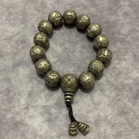 A FINELY CARVED WHITE BRONZE BRACELETS
