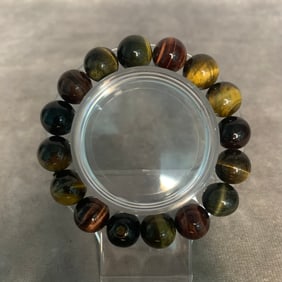 A FINE TIGER EYE STONE MADE BRACELET