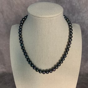 A FINE BLACK PEARL MADE NECKLACE