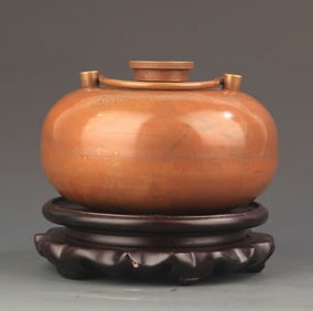 A FINE BRASS MADE HAND WARMER