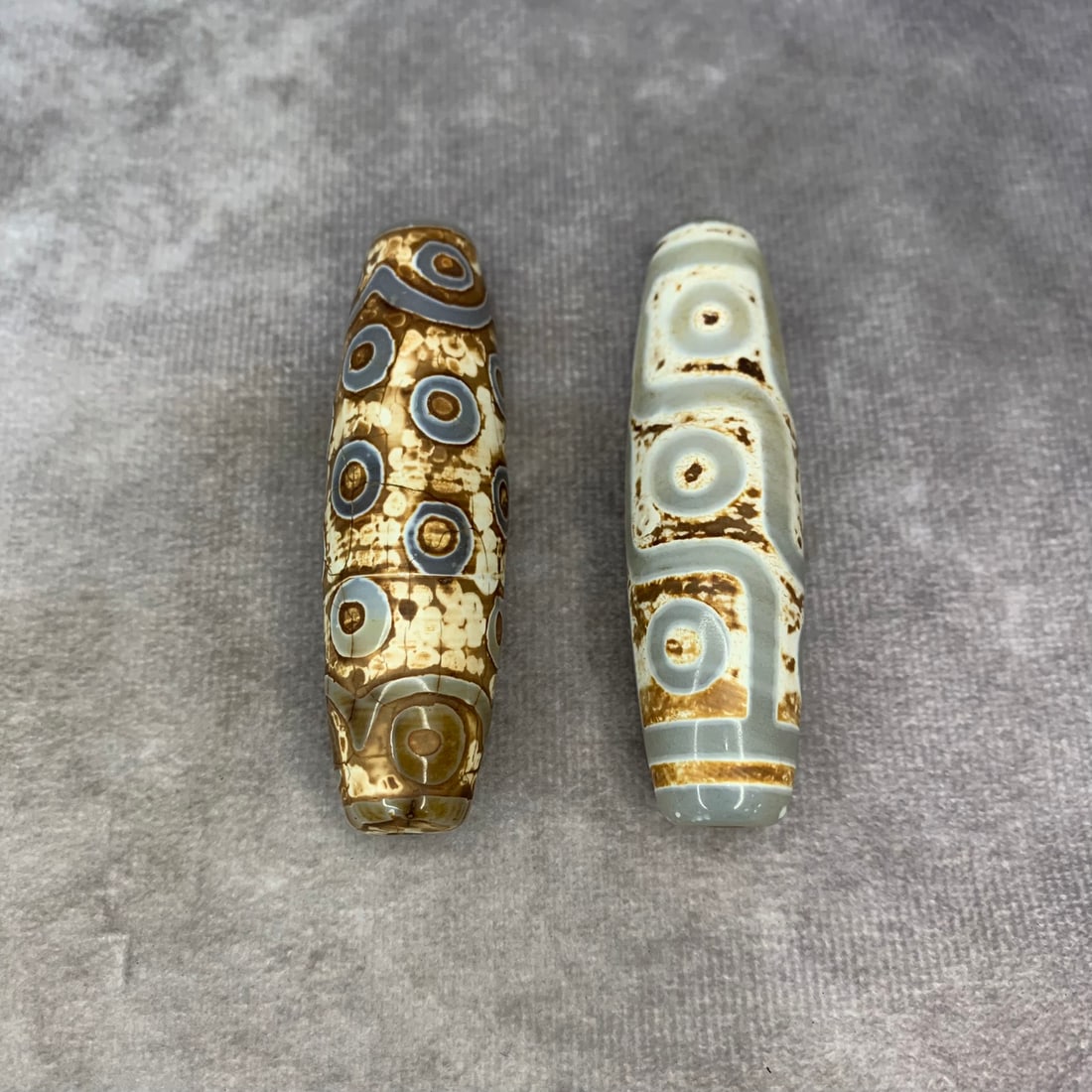 GROUP OF TWO TIBETAN DZI BEAD (1 of 5)