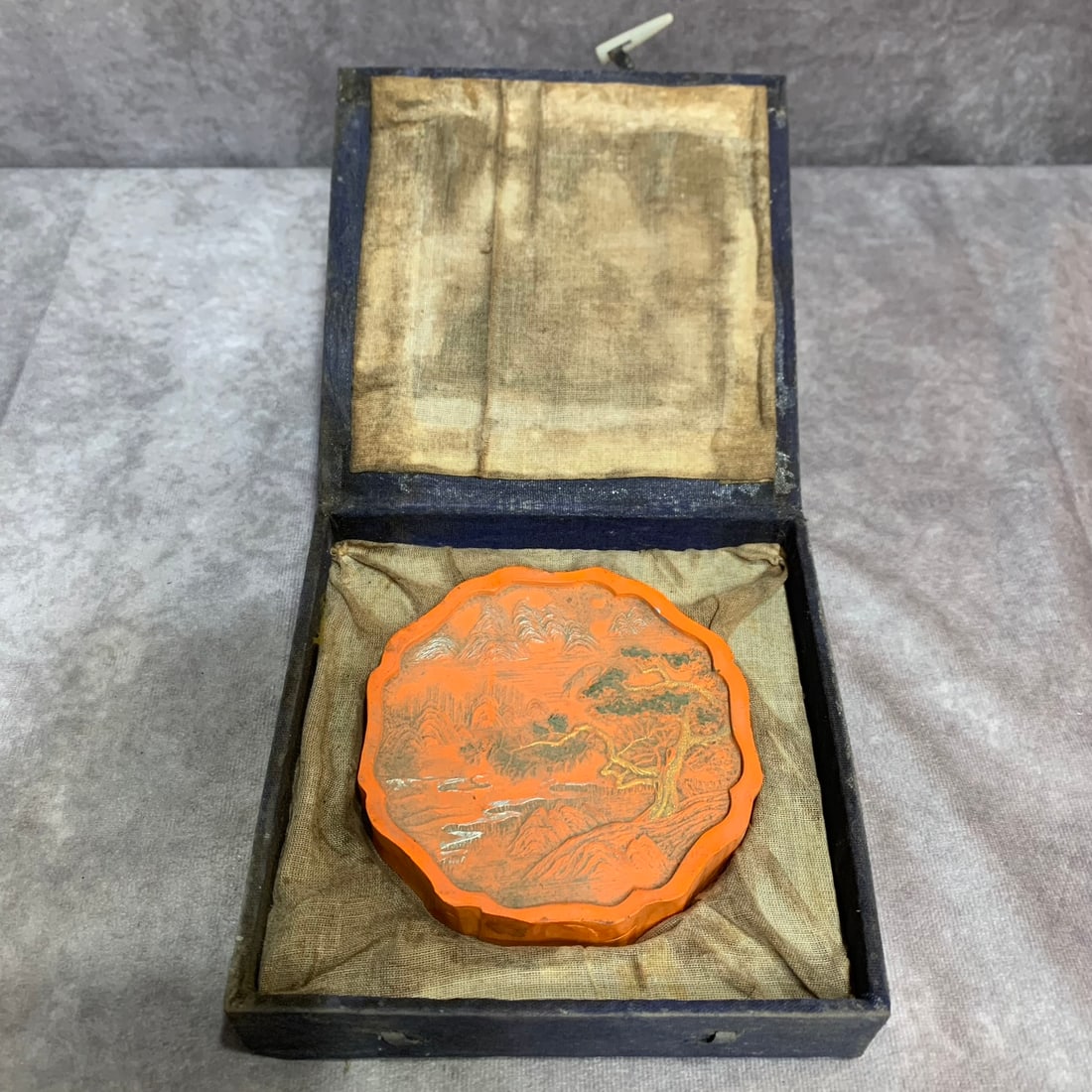 A FINELY CARVED CINNABAR MADE CALLIGRAPHY INK: Republic Period, High: 0.7 inch; Diameter: 4.1 inch;