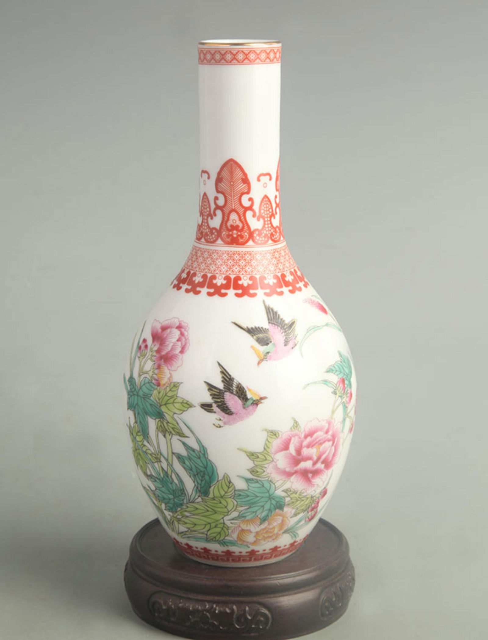 FAMILLE-ROSE PEONY AND DOUBLE-SWALLOW LONG-NECK VASE: Qing Dynasty Yong Zhen Period; High: 8.50 inch; Width: 3.50 inch;