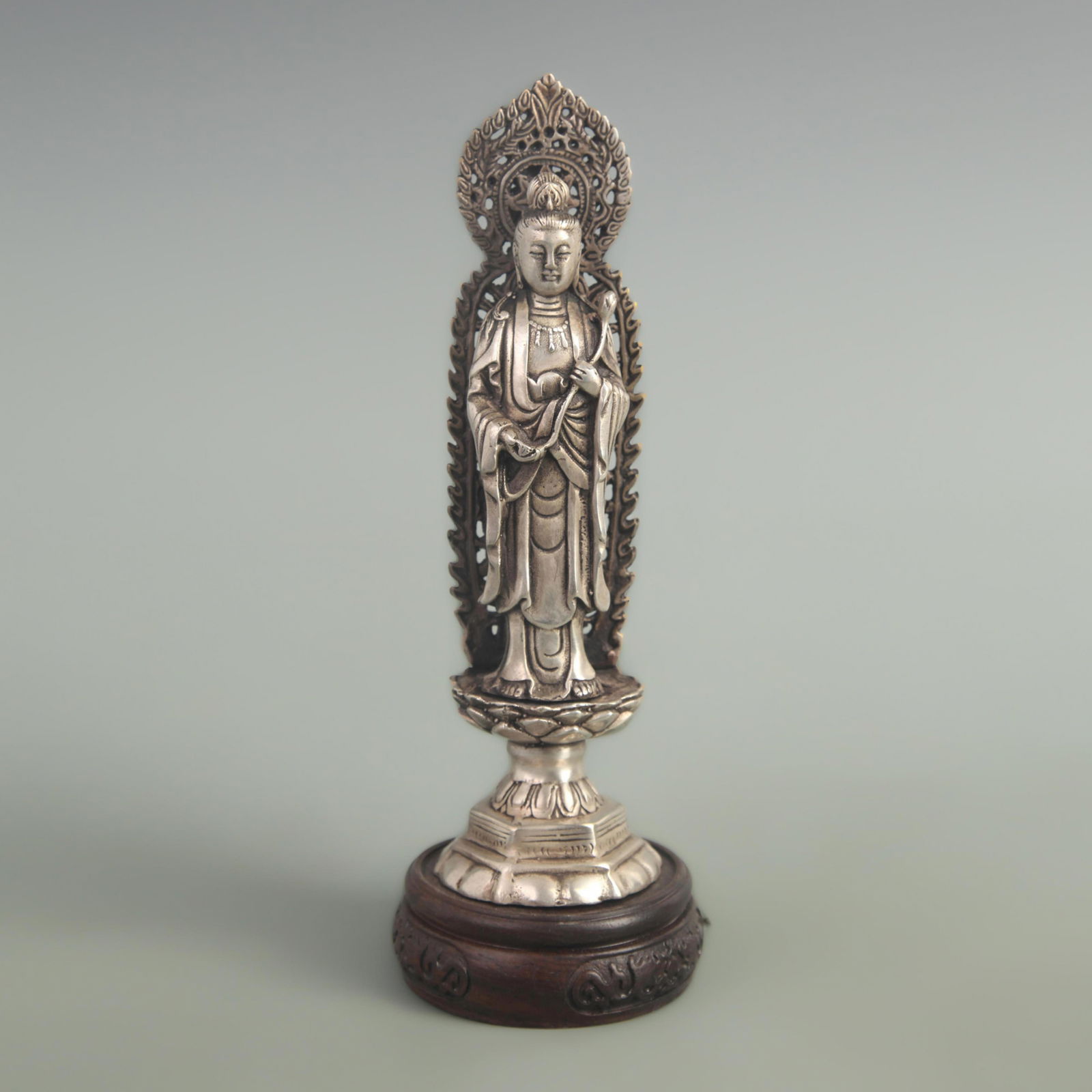A FINE WHITE BRONZE GUAN YIN STATUE: 20th Century; High: 7.80 inch Diameter: 2.10 inch