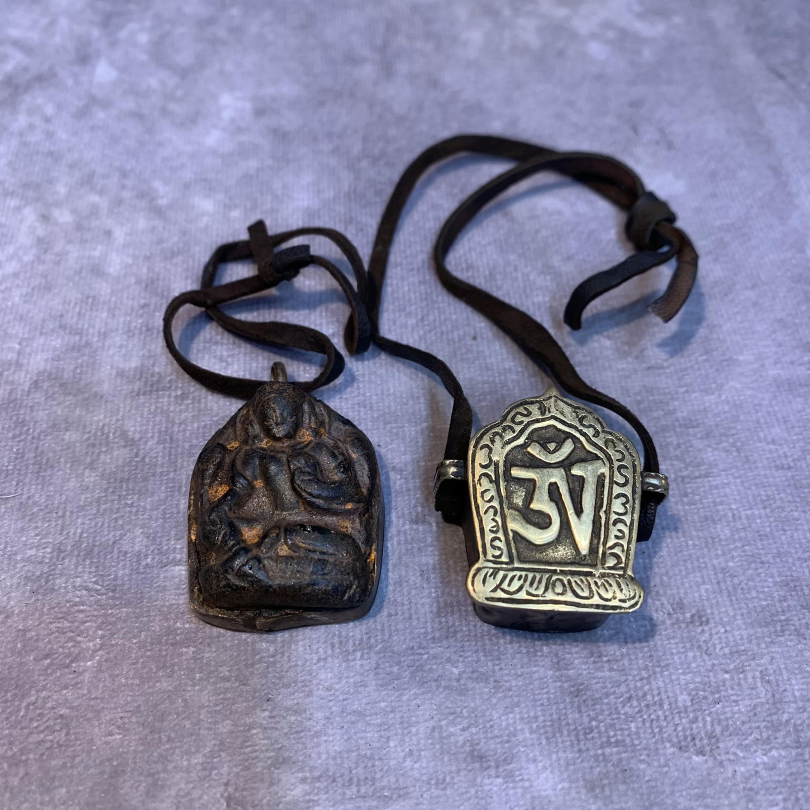 GROUP OF TWO SMALL TIBETAN BUDDHIST PENDANT (1 of 3)