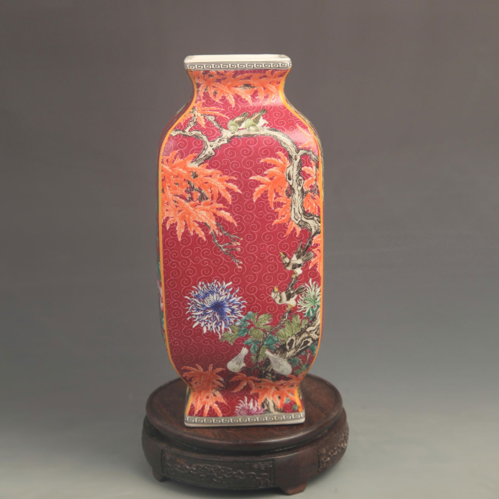 FAMILLE-ROSE PURPLE-GROUND FLORAL PATTERN SQUARE PORCELAIN VASE: Qing Dynasty Qian Long Period; High: 10.08 inch; Diameter: 4.80 inch