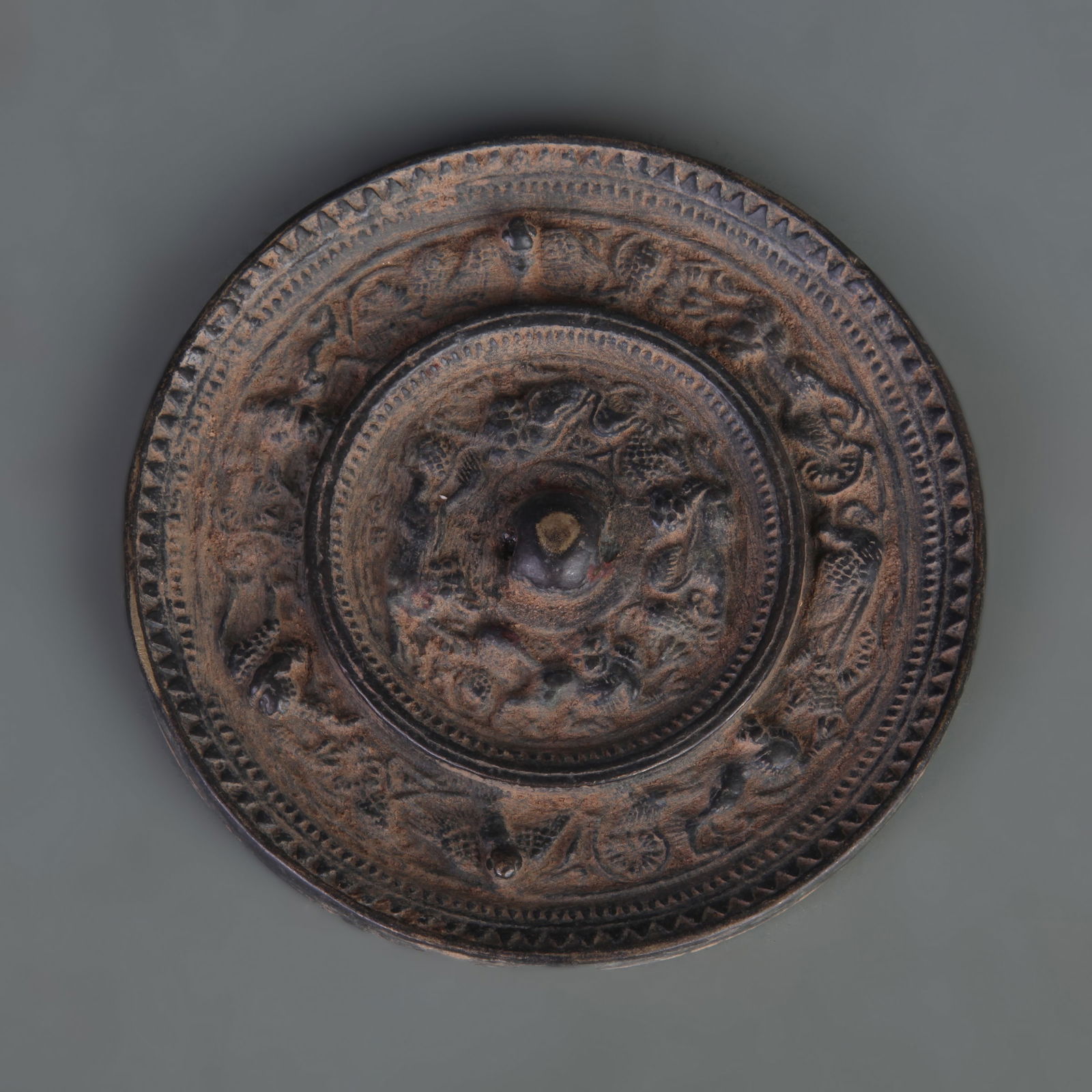 BRONZE MIRROR WITH SEA-CREATURE AND GRAPE DESIGN: Tang Dynasty Style; Diameter: 4.9 inch;
