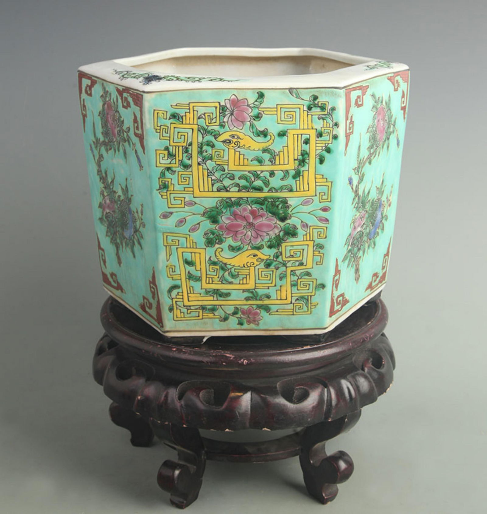 A GREEN GLAZED FAMILLE ROSE SIX SIDE FLOWER POT: Qing Dynasty, High: 6.80 inch; Diameter: 9.80 inch;