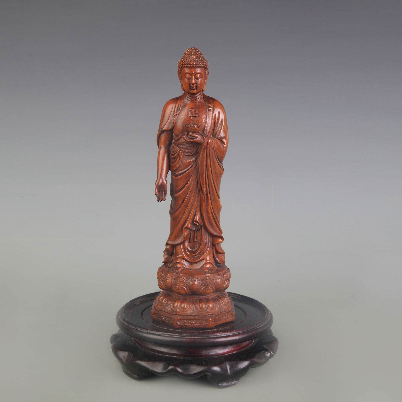 A FINE SMALL BOXWOOD MADE GAUTAMA BUDDHA STATUE: Qing Dynasty; High: 8.1 inch;
