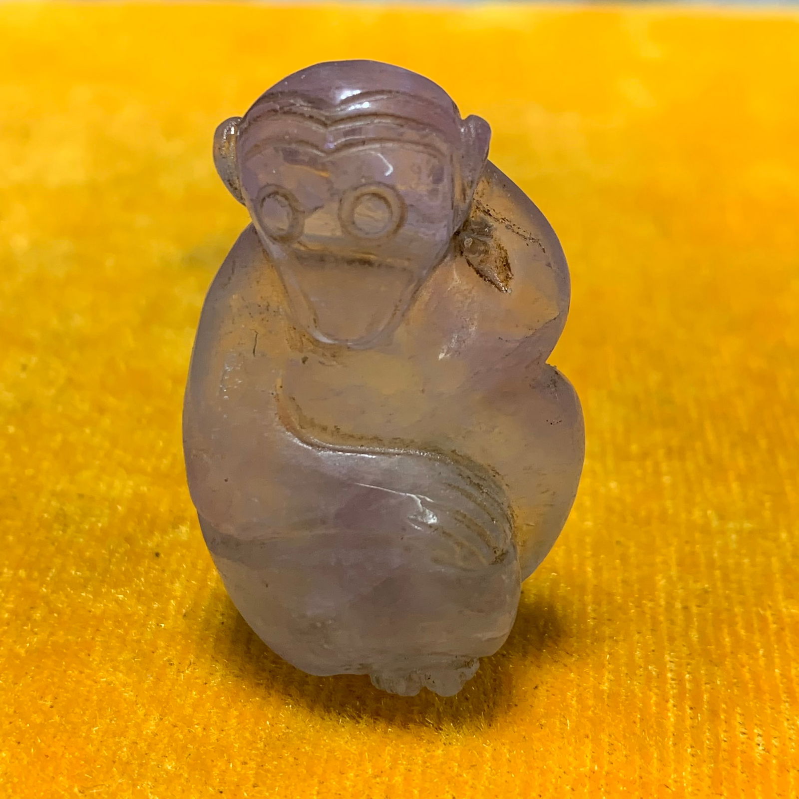 NATURAL AMETHYST MONKEY STYLE PENDANT: Republic Period; Long: 0.9 inch Width: 0.2 inch High: 0.5 inch
