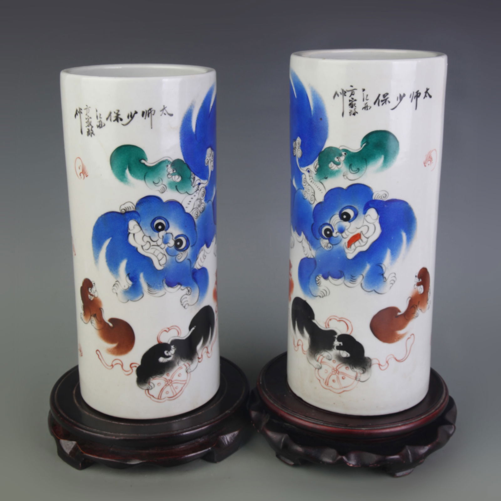 PAIR OF FAMILLE ROSE HAT STANDS WITH AUSPICIOUS BEAST PATTERNS (1 of 10)