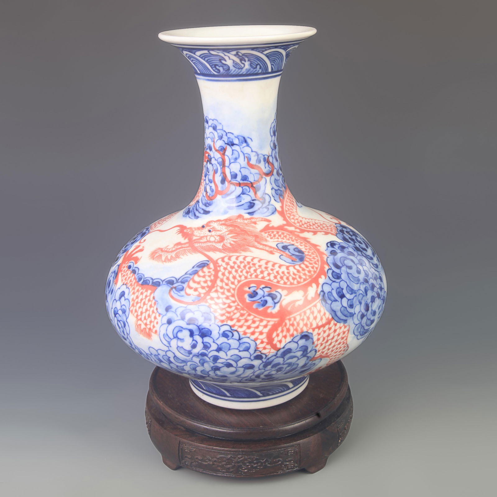BLUE AND WHITE UNDERGLAZE-RED WATER-CHESTNUT–SHAPED VASE: Qing Dynasty Yong Zheng Period; High:10.02 inch; Diameter: 8.00 inch;