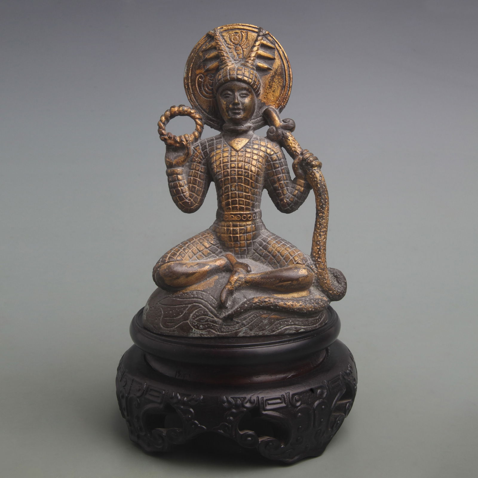 SERPENT-SHAPED BUDDHA STATUE