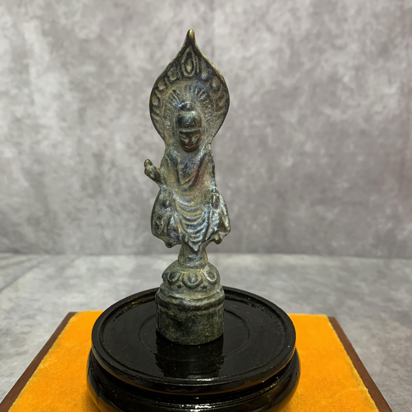 A SMALL TIBETAN BUDDHA STATUE: 20th Century; High: 4.3 inch; Width: 1.0 inch;