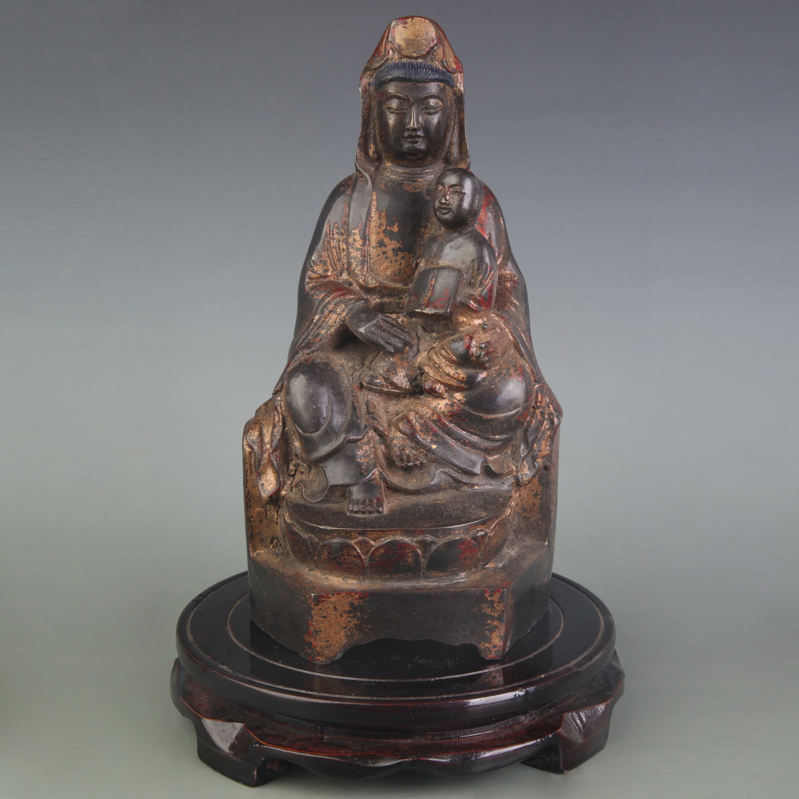 A FINE BRONZE CHILD-GIVING GUANYIN STATUE: Qing Dynasty; Width: 4.6 inch; High: 9.0 inch;