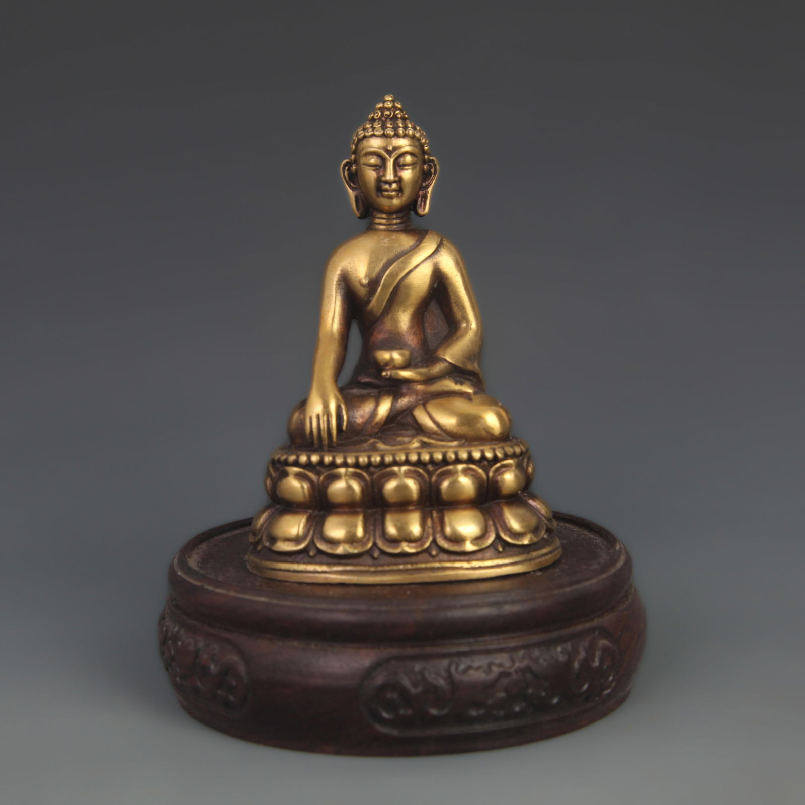 A FINE BRONZE STATUE OF SEATED SIDDHARTHA GAUTAMA (1 of 5)