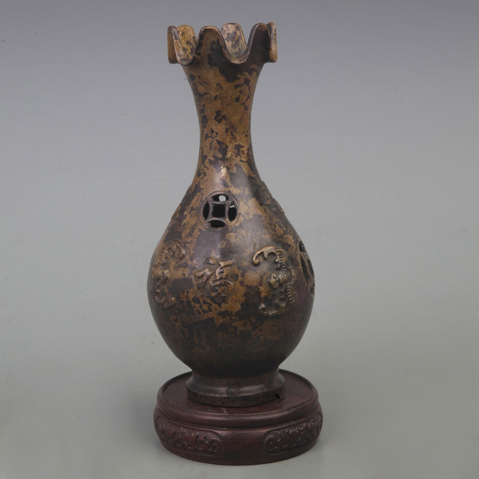 A FINE BRONZE FLOWER PATTERN BOTTLE (1 of 3)