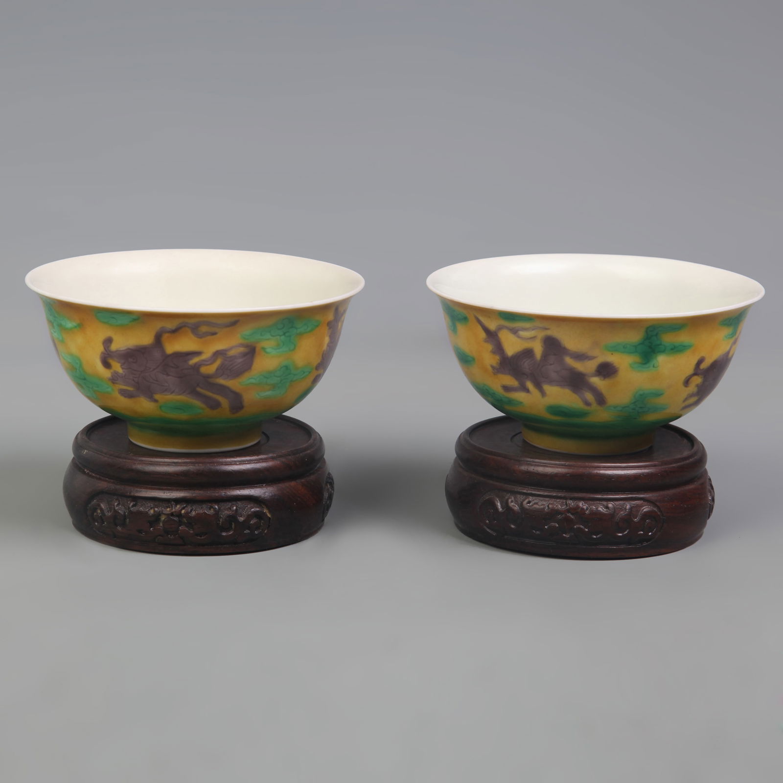 PAIR OF YELLOW GROUND BEAST PATTERN BOWLS (1 of 12)